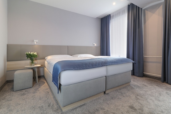 Double Room | Minibar, in-room safe, desk, blackout drapes