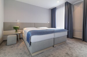 Double Room | Minibar, in-room safe, desk, blackout drapes