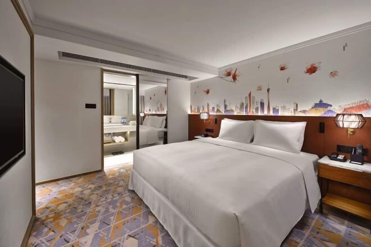 Premium bedding, down duvets, memory-foam beds, in-room safe