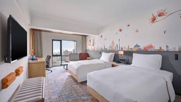 Premium bedding, down duvets, memory-foam beds, in-room safe
