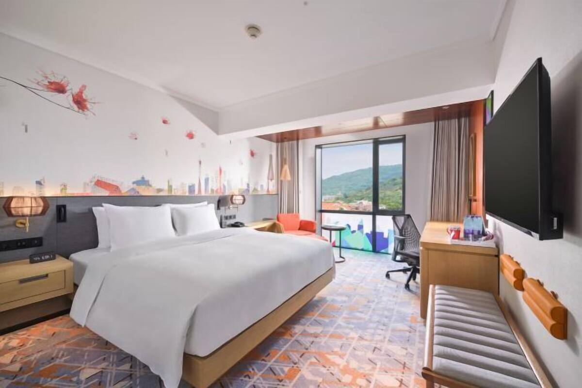 Premium bedding, down duvets, memory-foam beds, in-room safe
