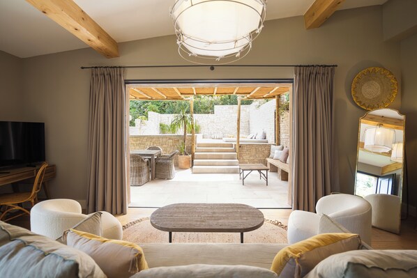 Bergerie Suite 2-bedroom with swimming pool | Living area | Flat-screen TV