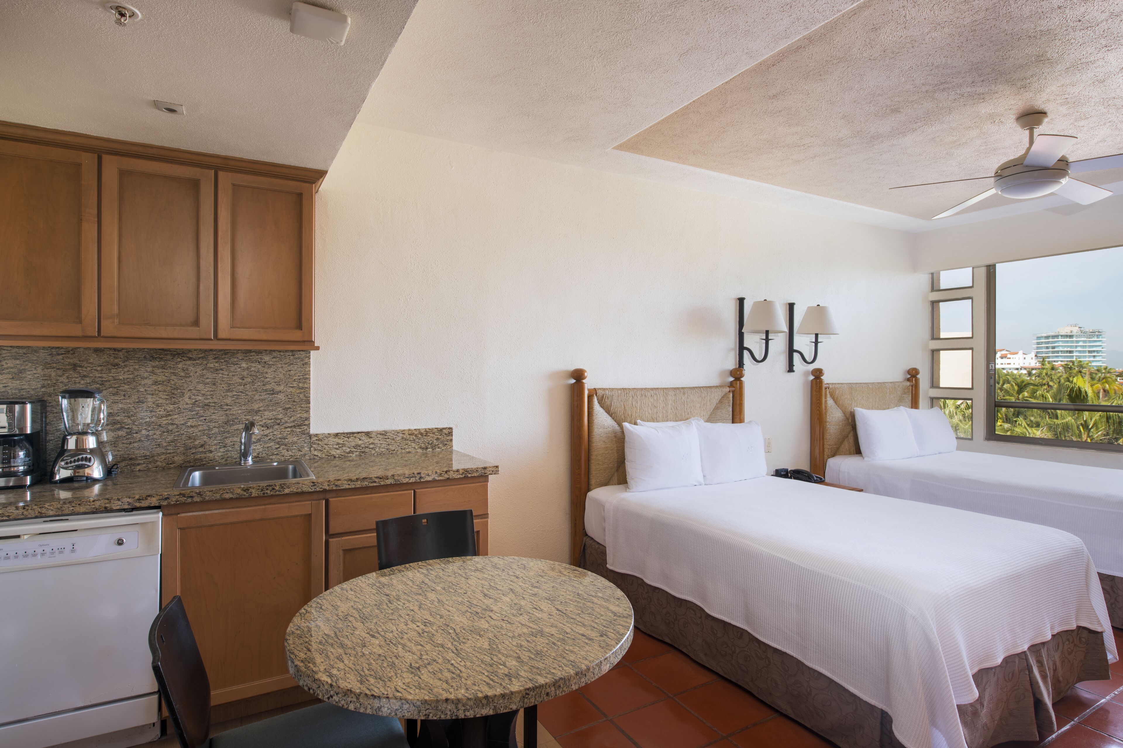 studio, 2 double beds, garden view | 2 bedrooms, in-room safe, iron/ironing board, free cots/infant beds