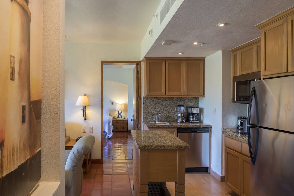 grand suite kids free | living area | 32-inch lcd tv with cable channels, tv