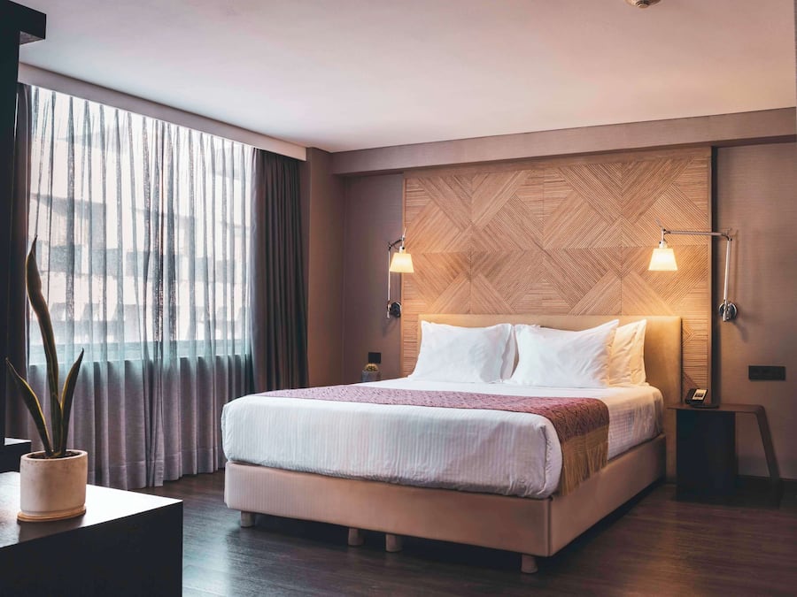 Premium bedding, down comforters, pillowtop beds, in-room safe