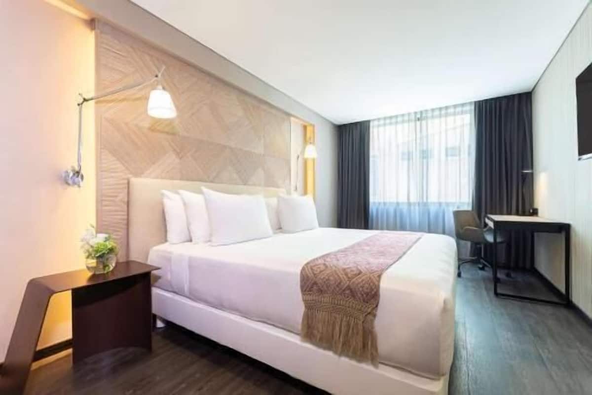 Premium bedding, down comforters, pillowtop beds, in-room safe