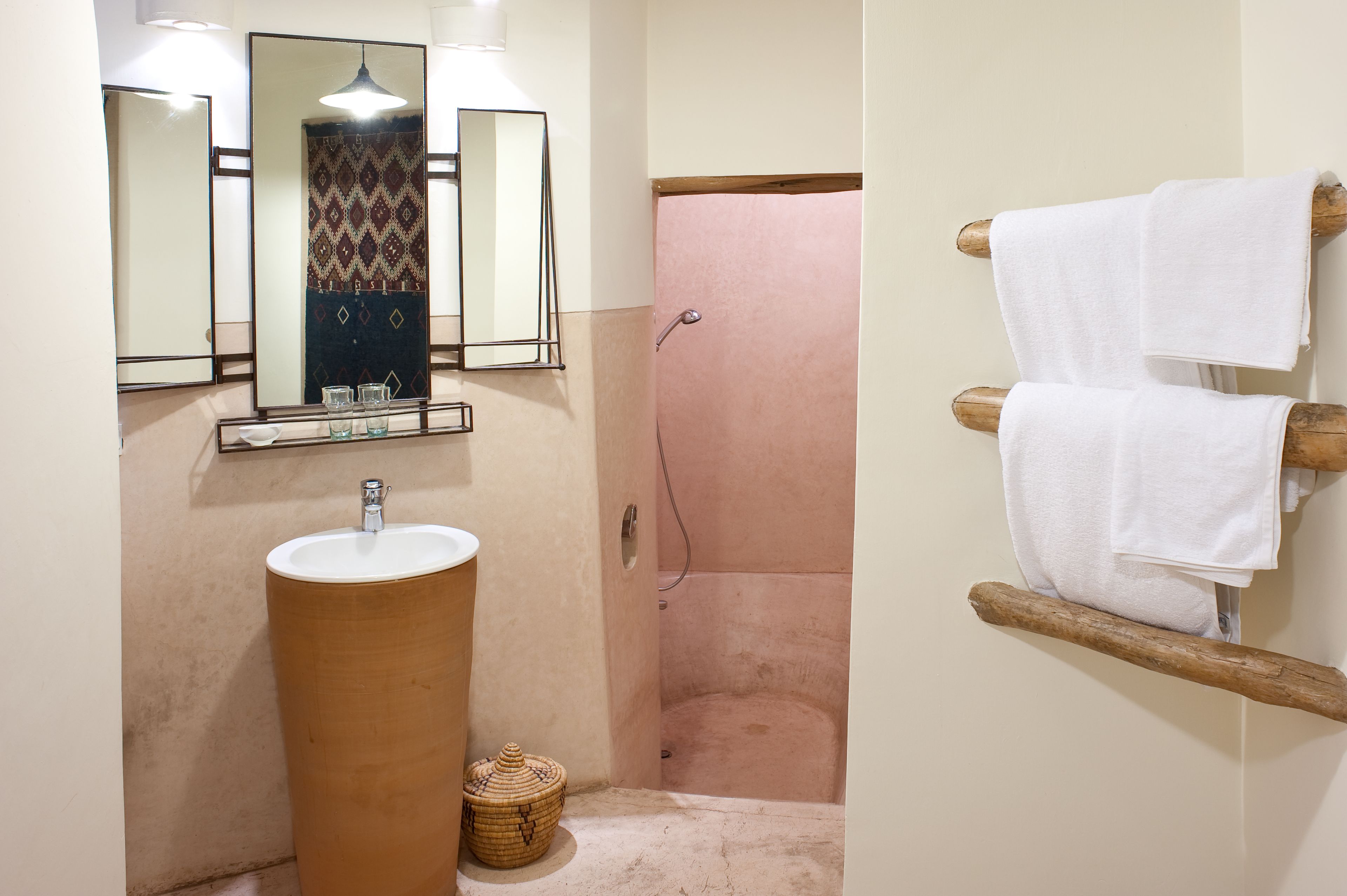 designer toiletries, hair dryer, bathrobes, slippers