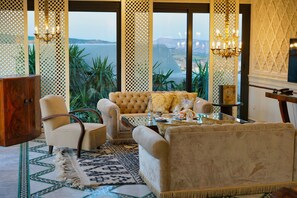 Grand Suite, 1 King Bed, Non Smoking, City View | Living area | 45-inch TV with digital channels - Riad Maison Bleue And Spa (Fes)