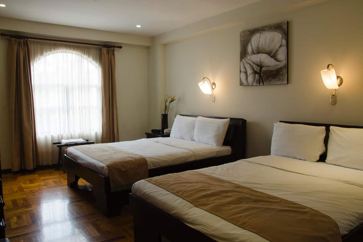 2 bedrooms, hypo-allergenic bedding, down comforters