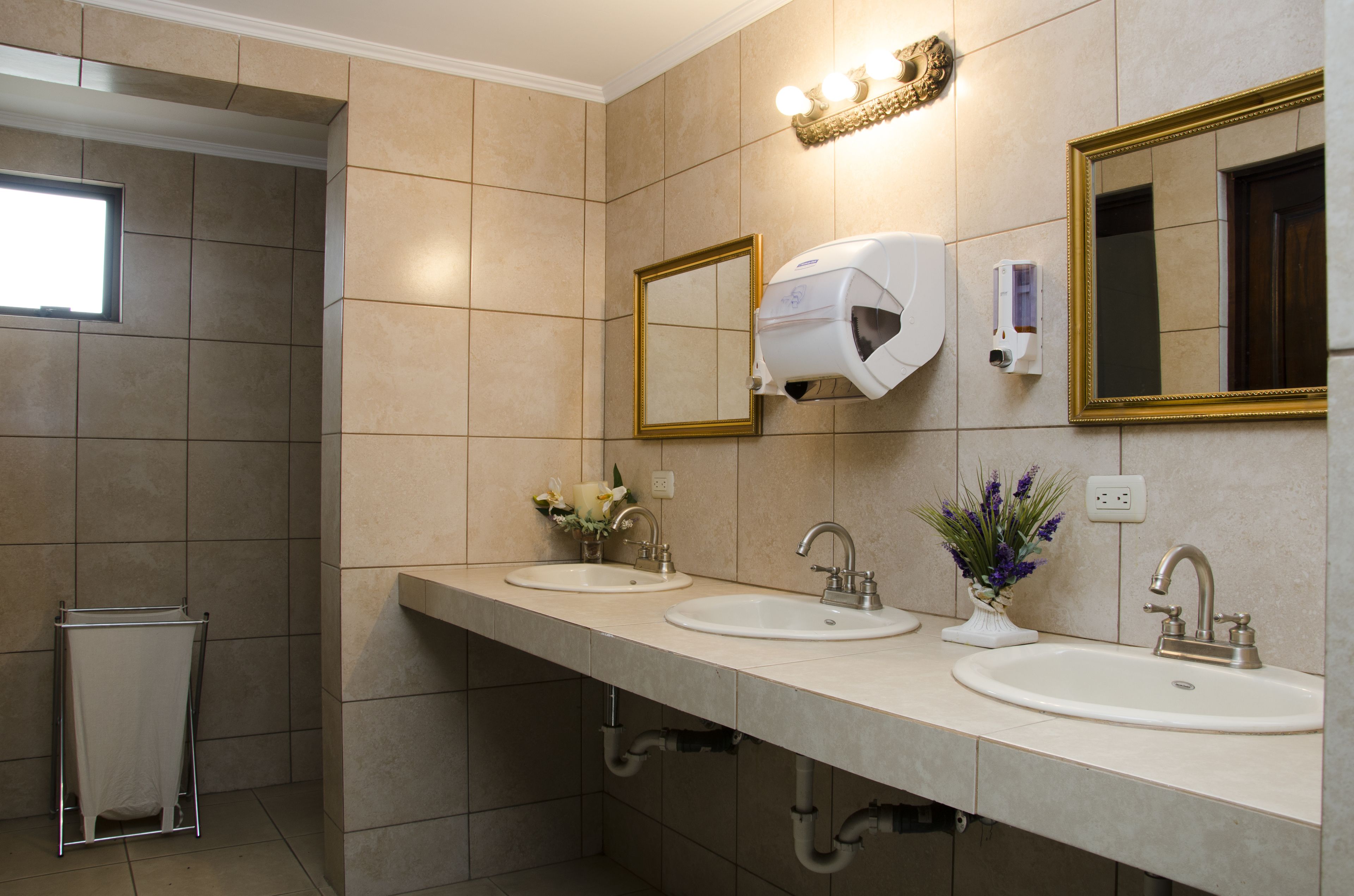 superior apartment | bathroom | rainfall showerhead, hair dryer, towels, soap