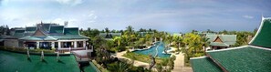 A resort with multiple buildings, a central swimming pool, and lush greenery. - Andaman Princess Resort & Spa (Takua Pa)