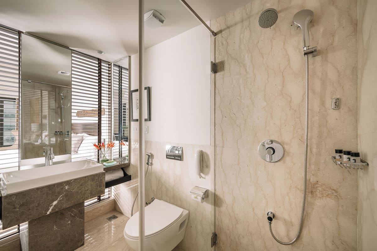 shower, designer toiletries, bathrobes, slippers