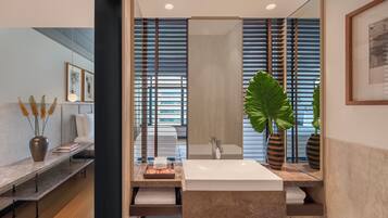 Shower, designer toiletries, bathrobes, slippers