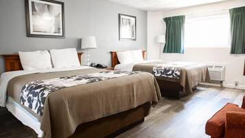 Premium bedding, down duvets, desk, laptop workspace