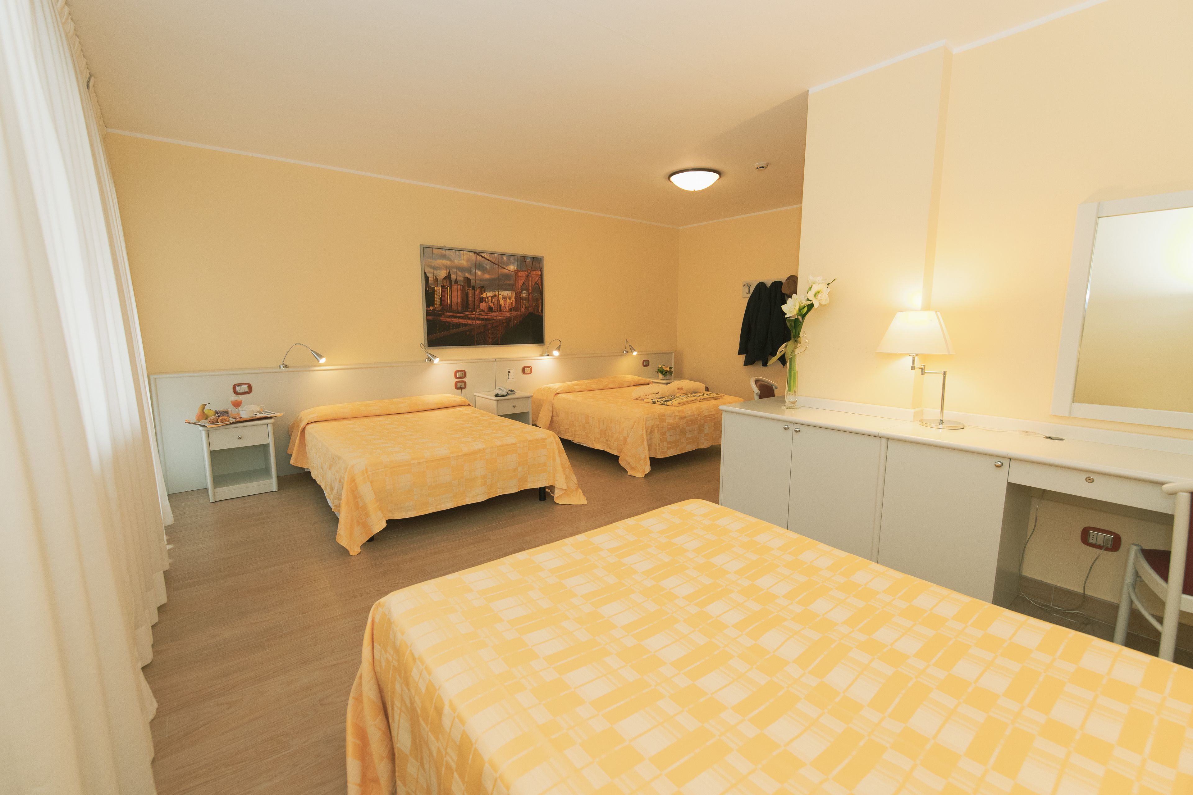 standard triple room | in-room safe, desk, free wifi, bed sheets