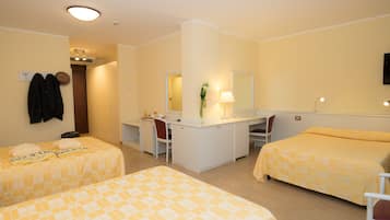 Triple Room with Balcony | In-room safe, desk, free WiFi, bed sheets