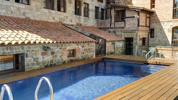 Outdoor pool, pool umbrellas, pool loungers