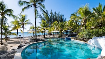 Outdoor pool, free cabanas, pool umbrellas