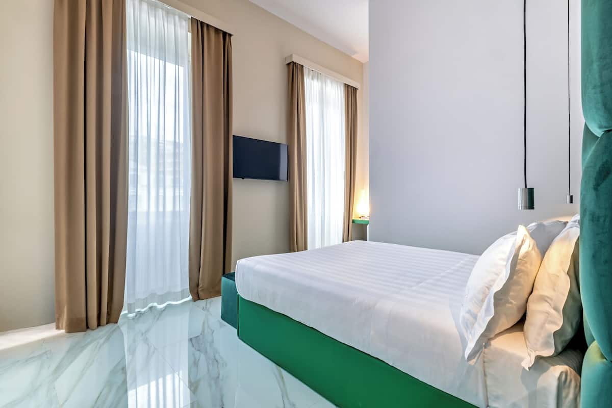 Ropa de cama de alta calidad, colchones con acolchado adicional, minibar