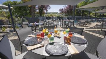 Breakfast, lunch, dinner served; French cuisine, pool views