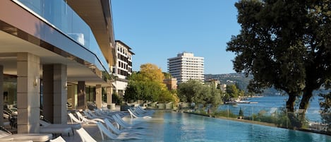 Indoor pool, outdoor pool, open 8:00 AM to 9:30 PM, pool umbrellas