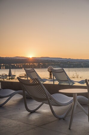 Indoor pool, outdoor pool, open 8:00 AM to 9:30 PM, sun loungers