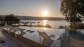 Indoor pool, outdoor pool, open 8:00 AM to 9:30 PM, pool umbrellas
