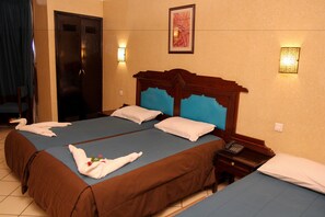 Triple Room | Minibar, individually decorated, individually furnished, desk - New Farah Hotel (Agadir)