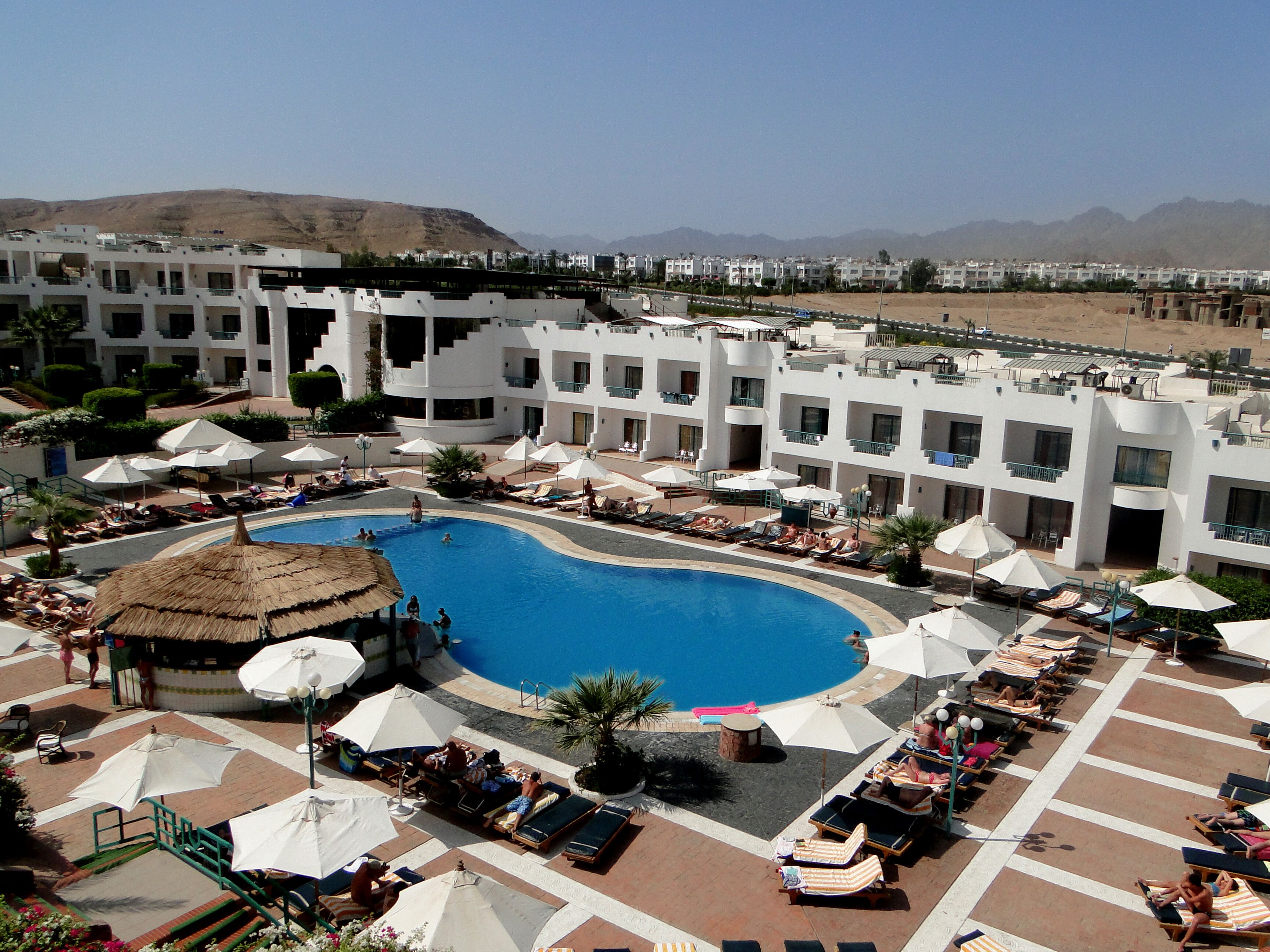 2 outdoor pools, open 8:00 AM to 5:30 PM, pool umbrellas, pool loungers