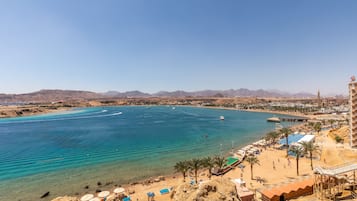 Private beach, beach towels, scuba diving, beach volleyball