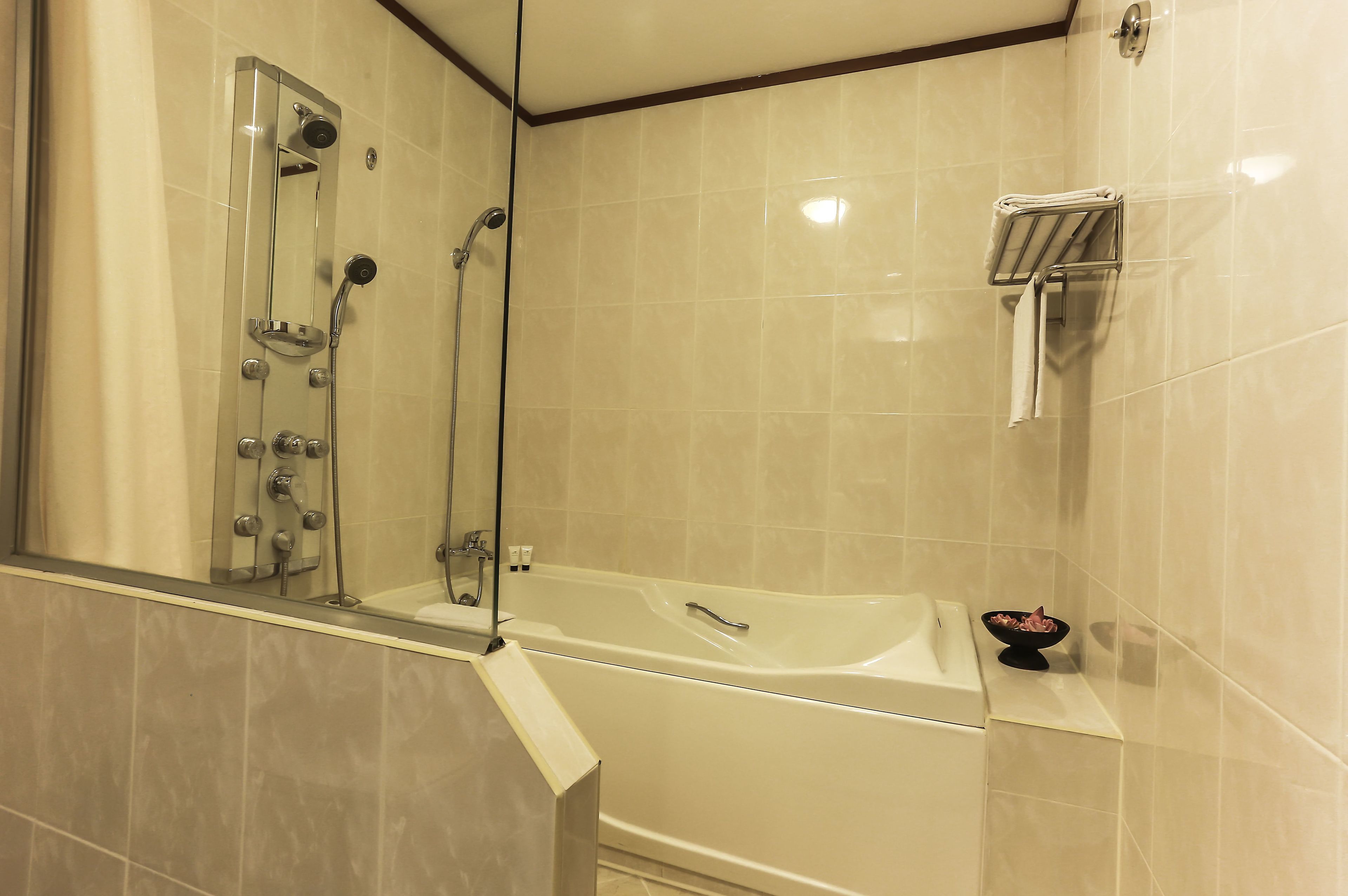 family suite, multiple beds | bathroom | hair dryer, bathrobes, slippers, bidet