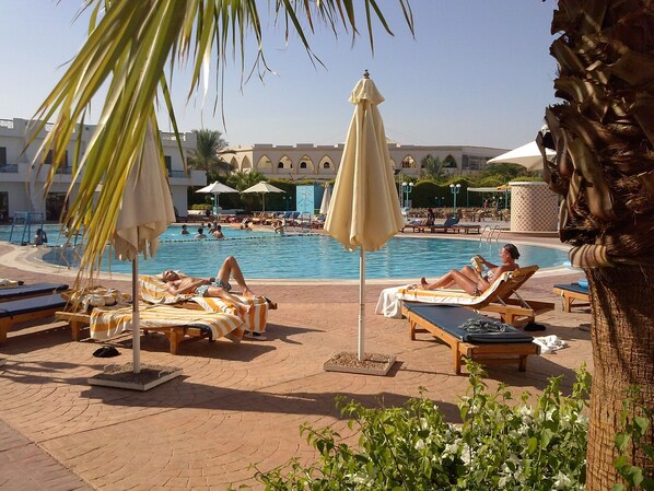 2 outdoor pools, pool umbrellas, pool loungers