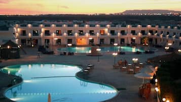 2 outdoor pools, pool umbrellas, pool loungers