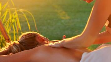 Guests can enjoy a rejuvenating massage in a serene natural setting.