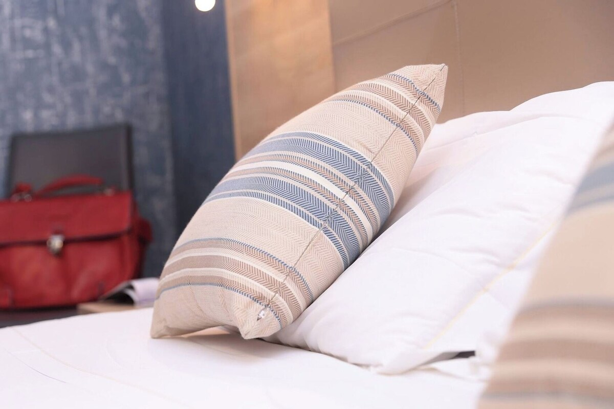 Desk, laptop workspace, free WiFi, bed sheets