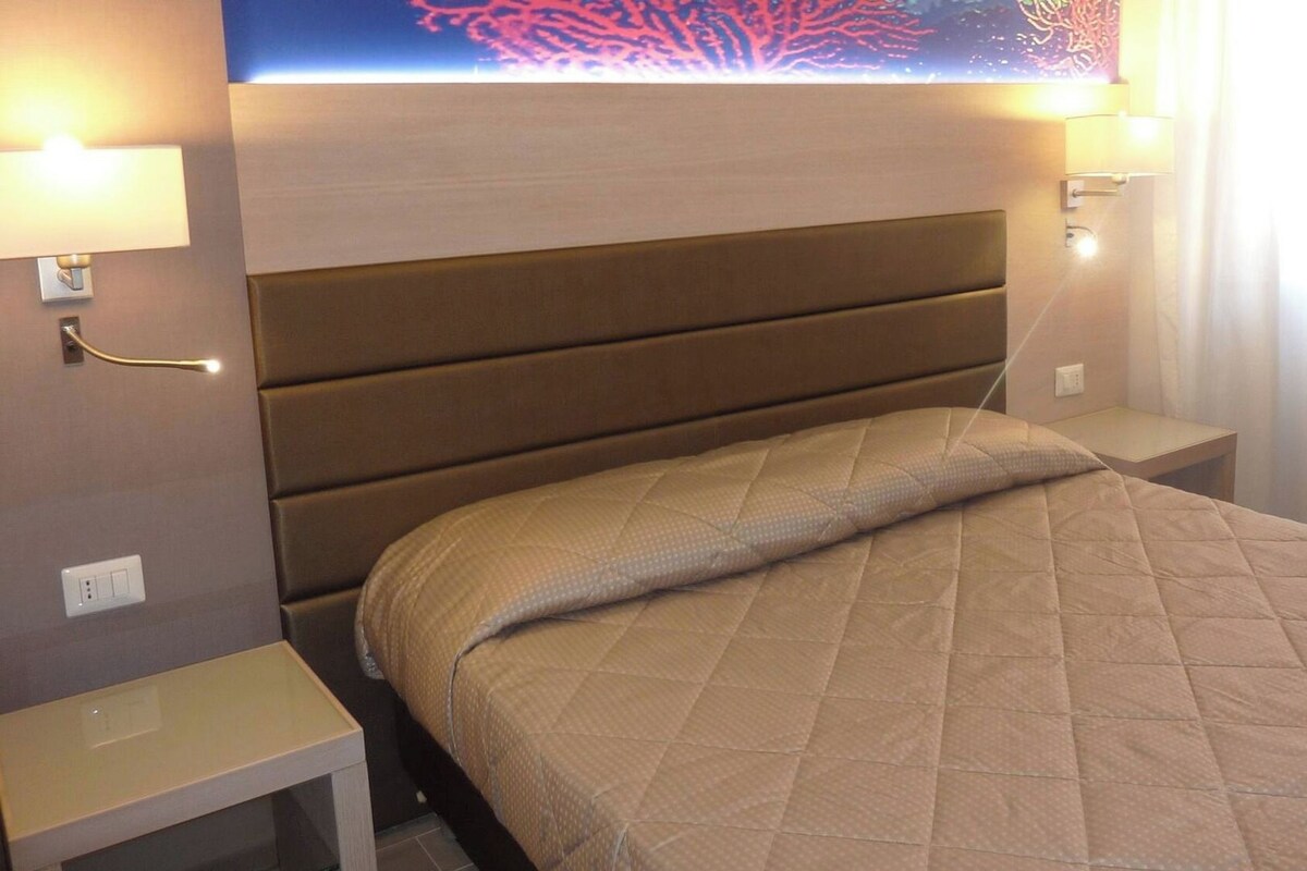 Desk, laptop workspace, free WiFi, bed sheets