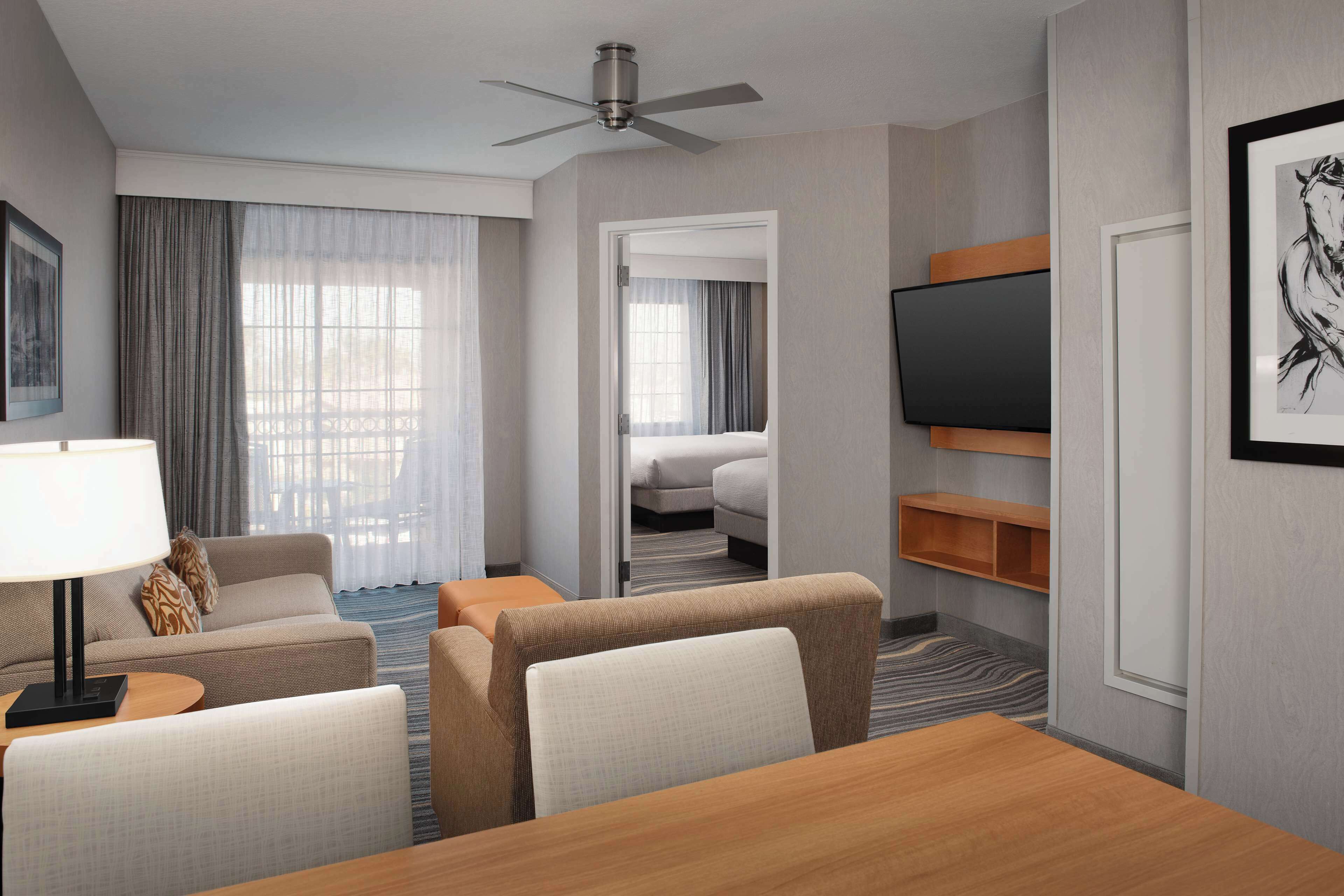 suite, 2 queen beds, non smoking | living area | 27-inch tv with cable channels, video game console