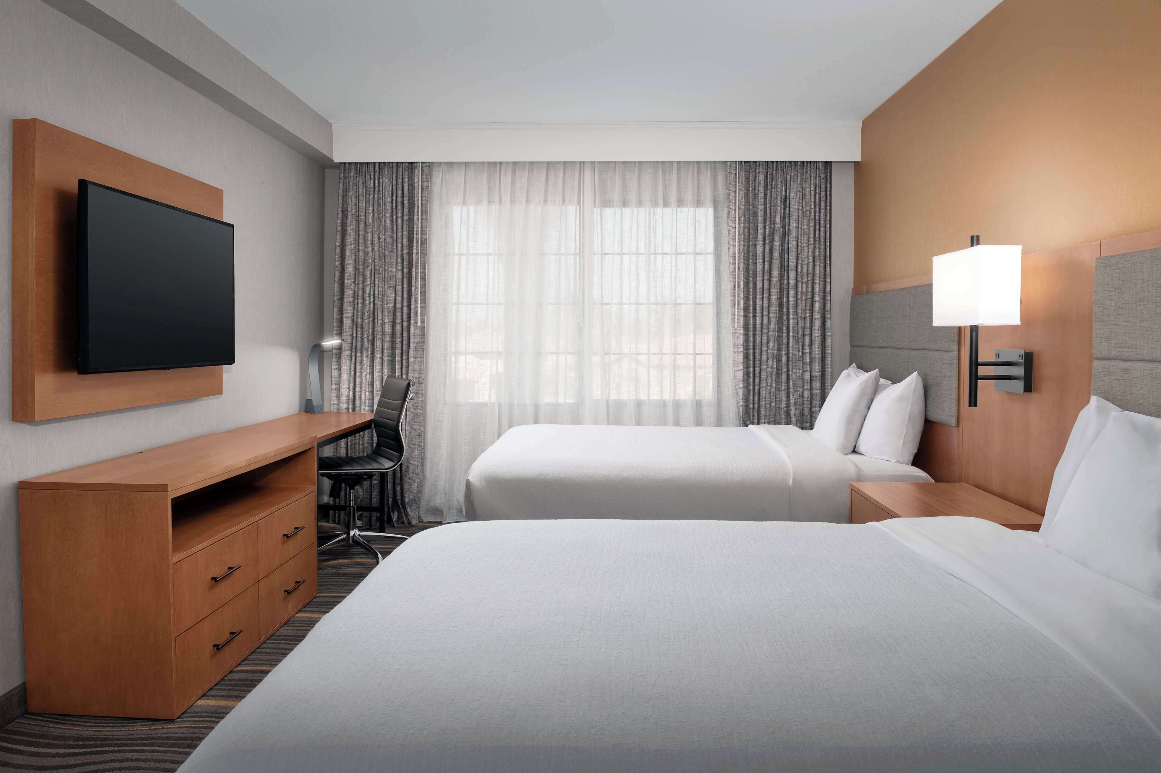 suite, 2 queen beds, non smoking | premium bedding, in-room safe, iron/ironing board, free cots/infant beds