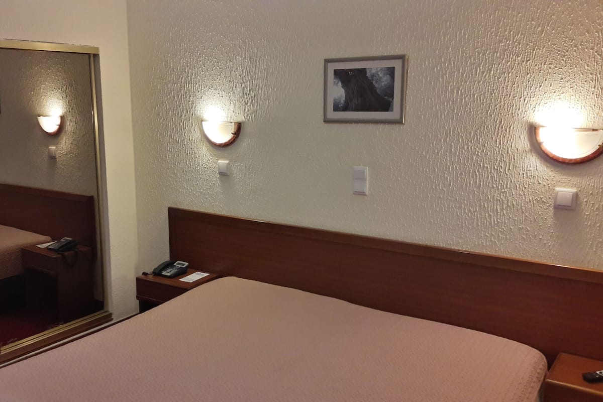 Desk, WiFi (free), bed sheets