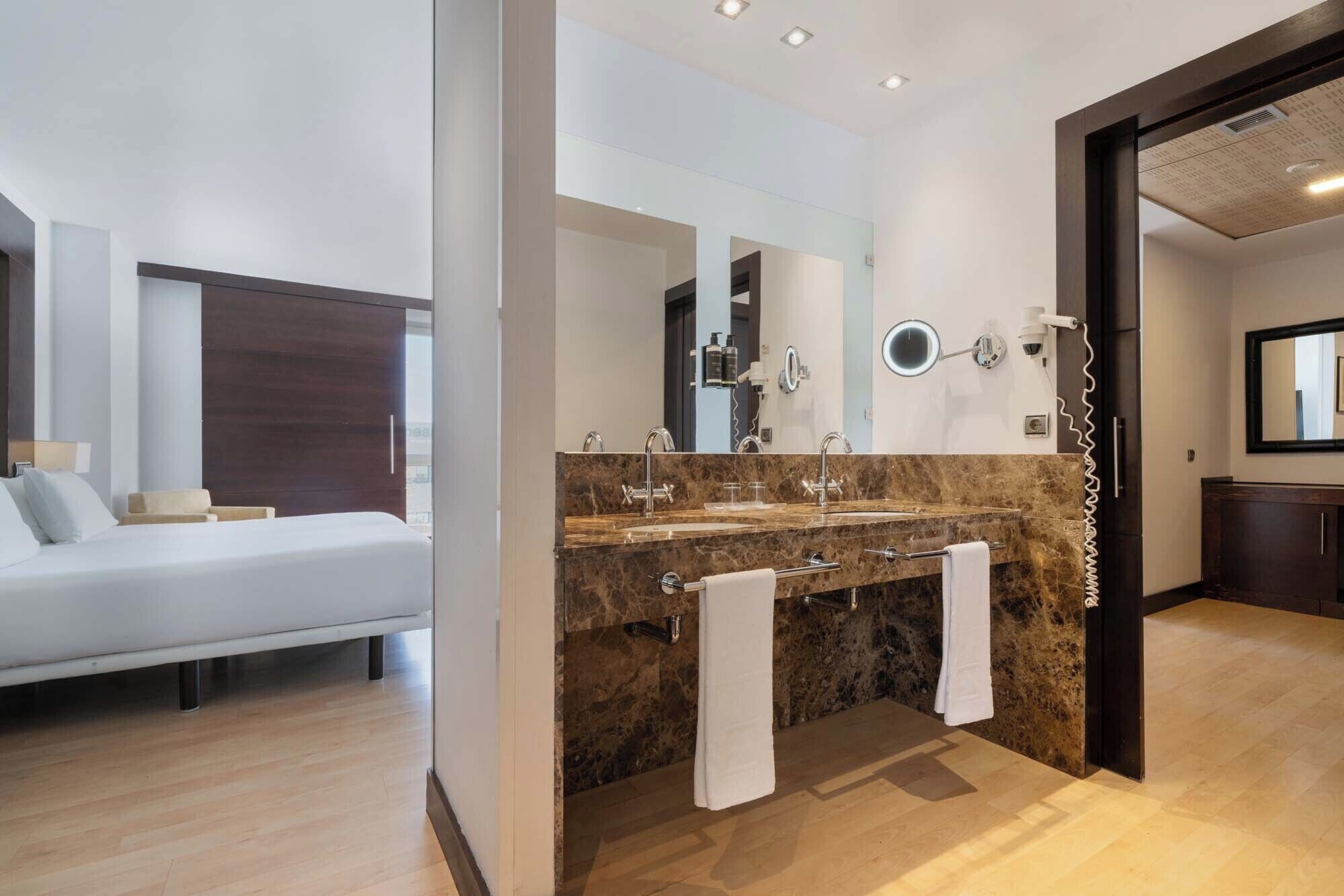 Eco-friendly toiletries, hair dryer, towels