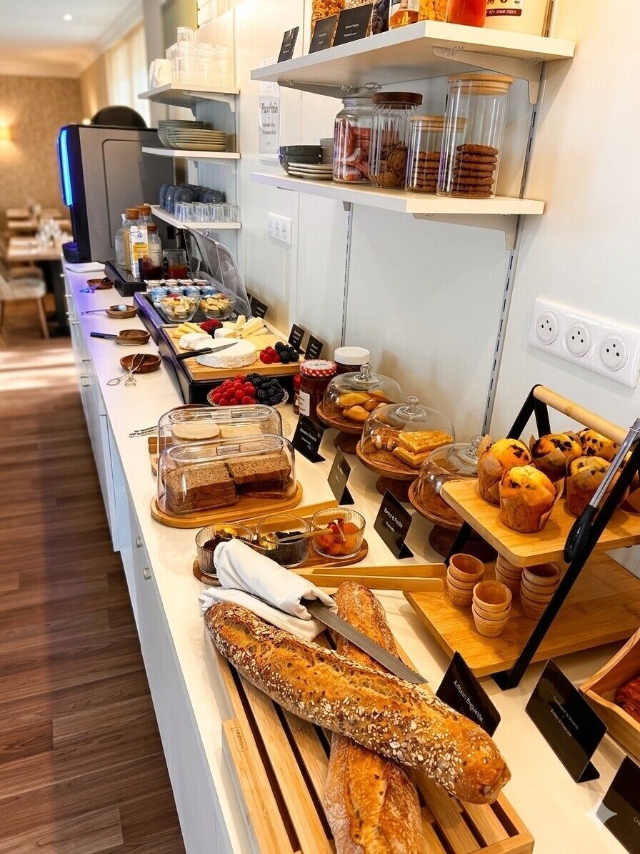 A buffet with various food items and a long counter.
