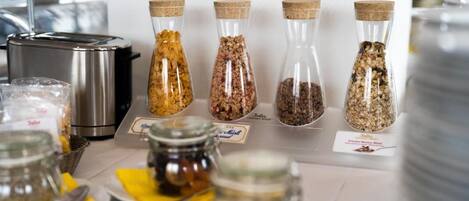 A kitchen counter with various food items and containers.