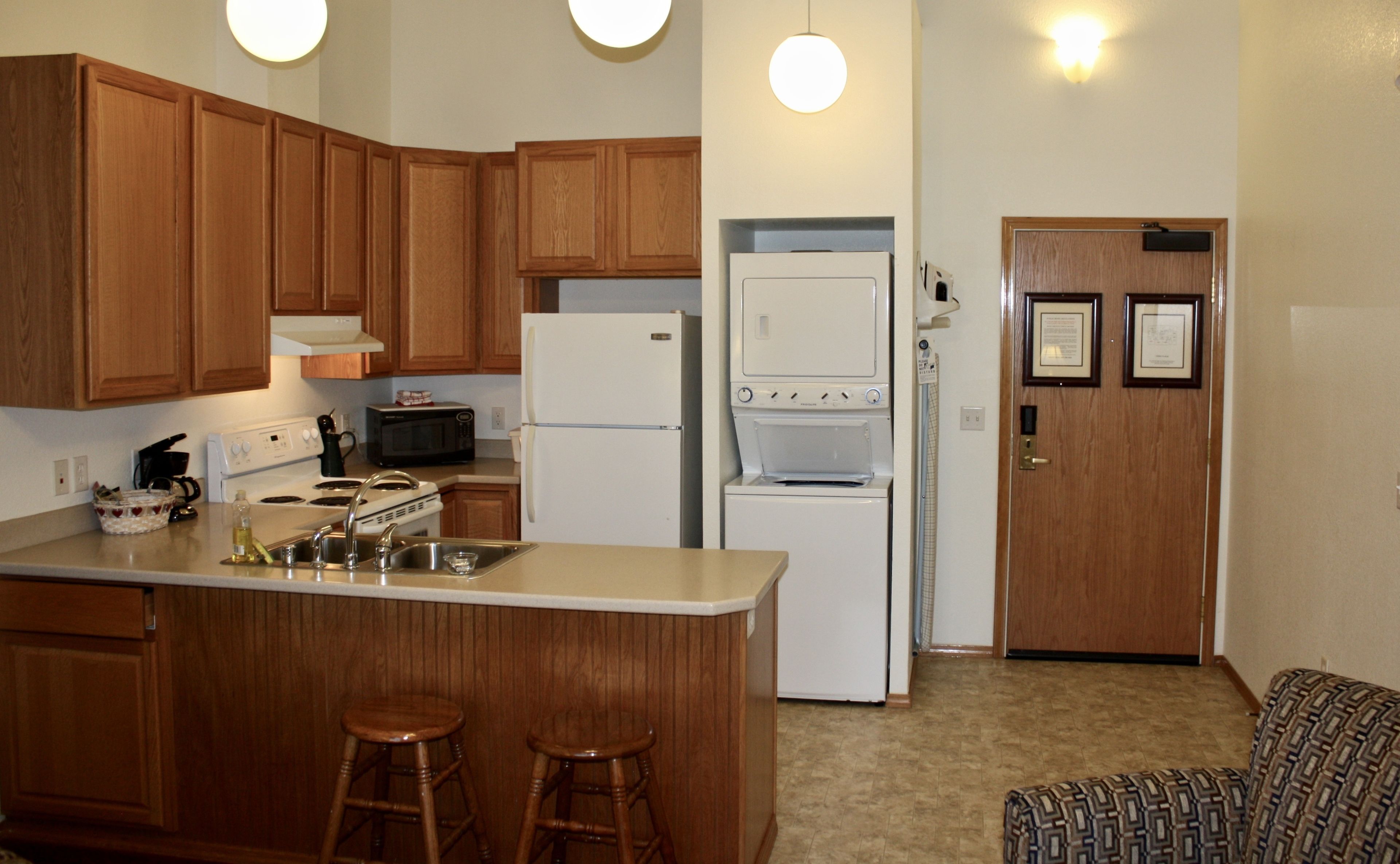 suite, 2 queen beds | private kitchen | full-sized fridge, microwave, oven, stovetop