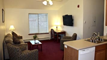 Suite, 2 Queen Beds | Living area | Flat-screen TV