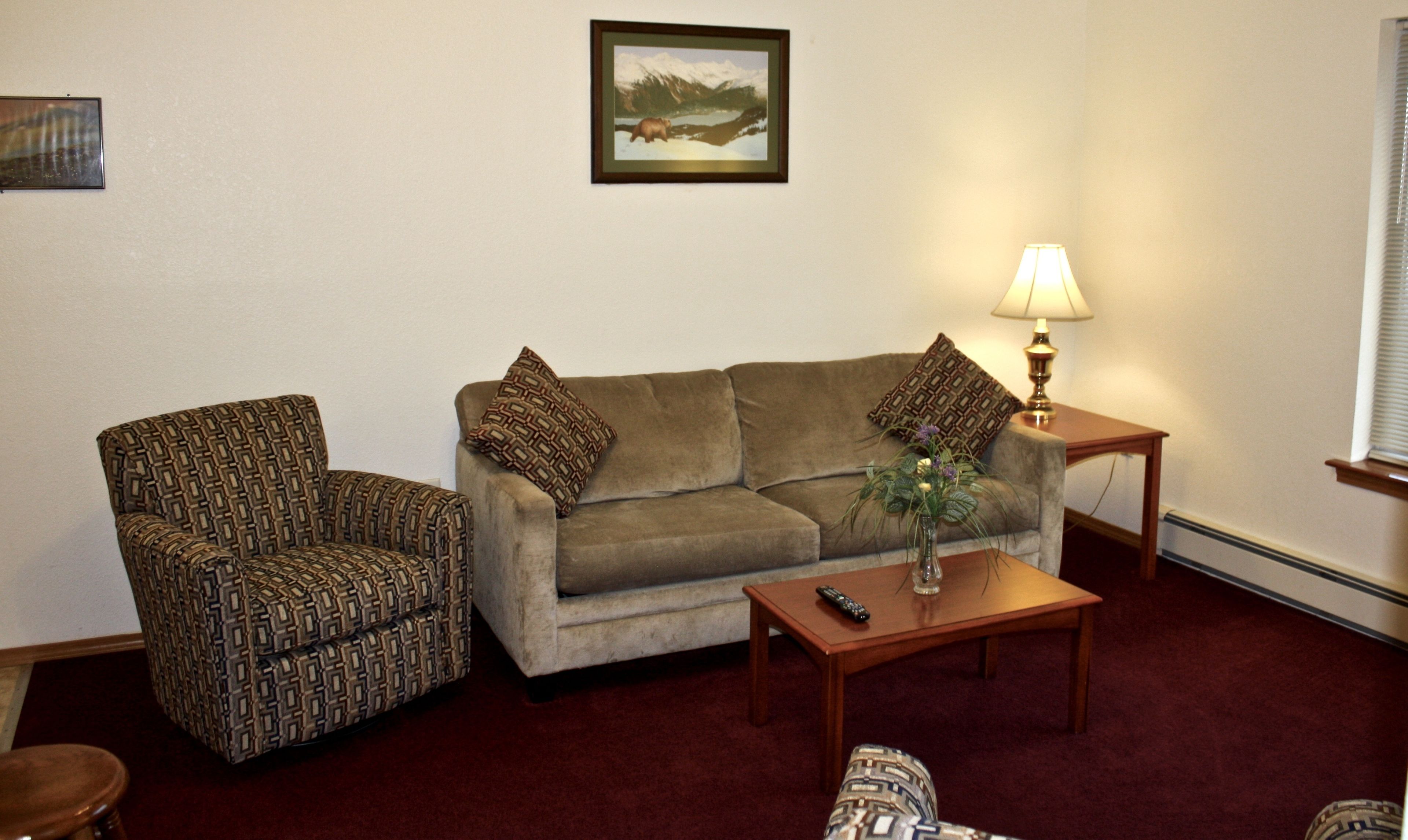 suite, 2 queen beds | living room | flat-screen tv