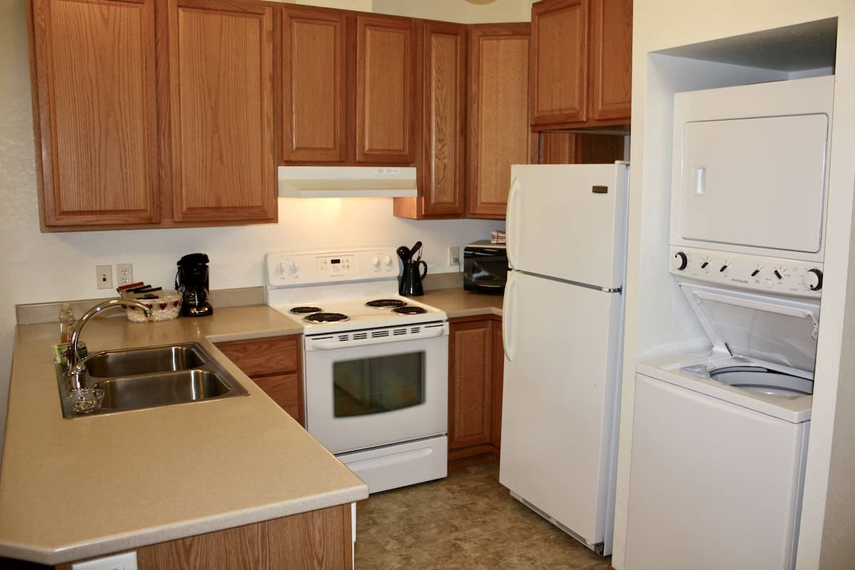 suite, 2 queen beds | private kitchen | full-sized fridge, microwave, oven, stovetop