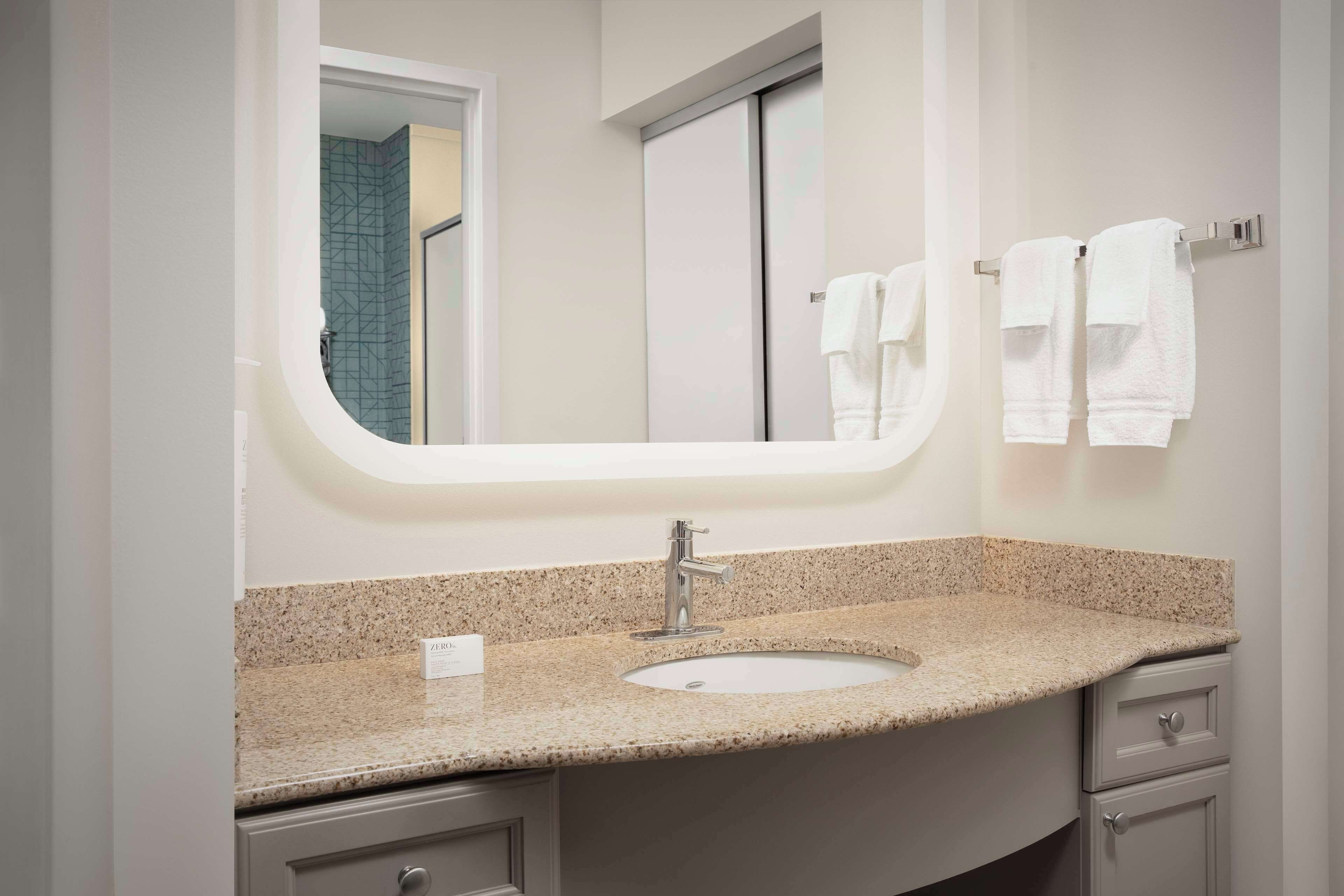 separate bathtub and shower, free toiletries, hair dryer, towels