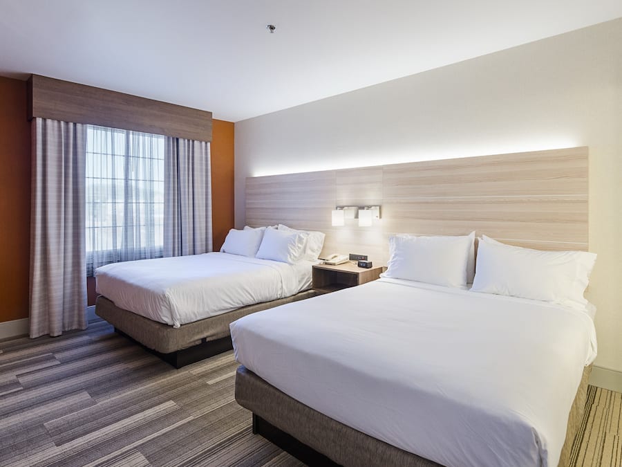 Desk, laptop workspace, blackout drapes, iron/ironing board