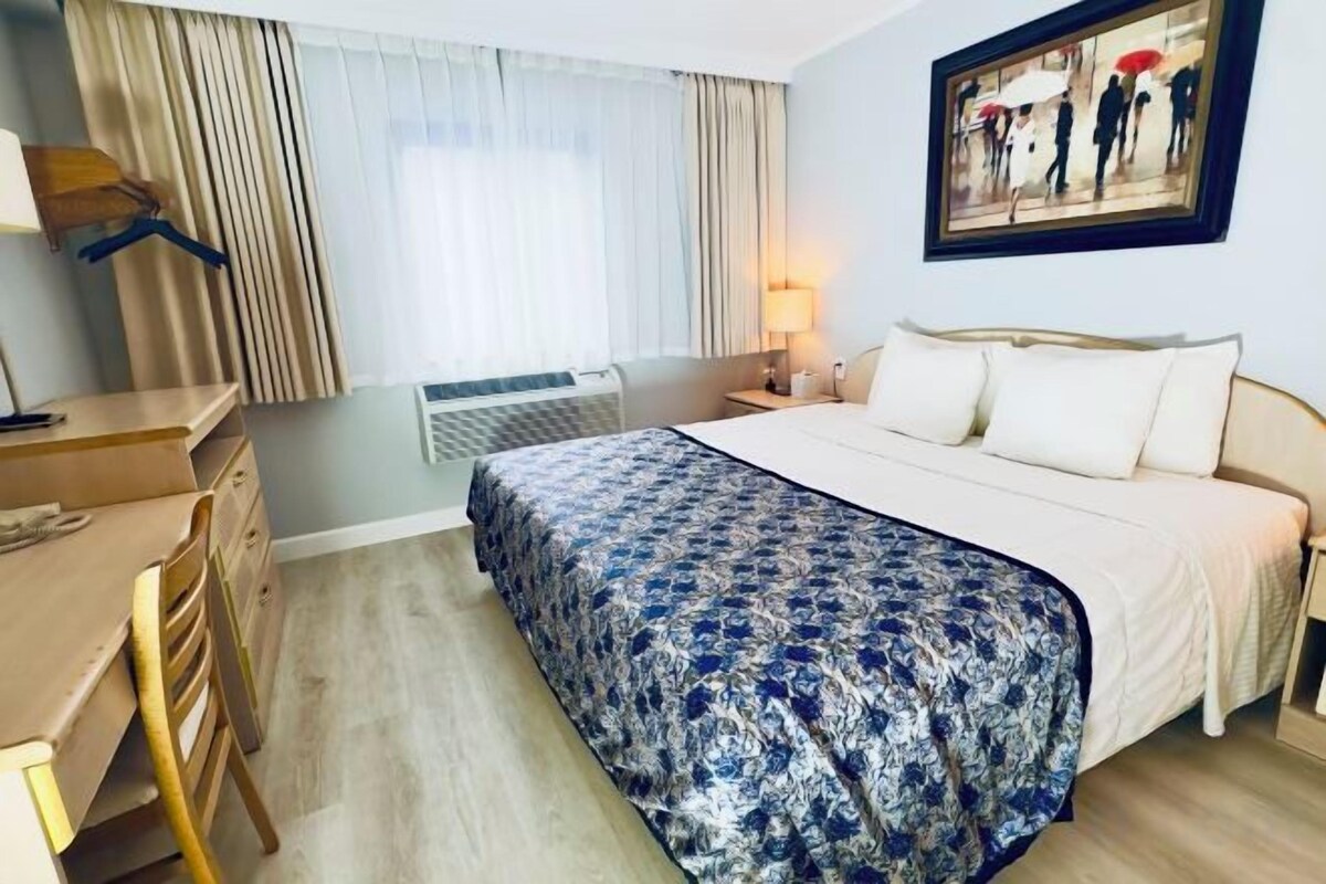Desk, laptop workspace, WiFi (free), bed sheets