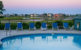 Indoor pool, seasonal outdoor pool, pool umbrellas, pool loungers